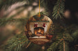 a christmas ornament hanging from a christmas tree