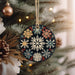 a christmas ornament hanging from a christmas tree