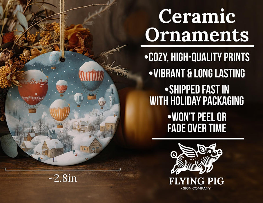 a ceramic ornament with hot air balloons in the sky