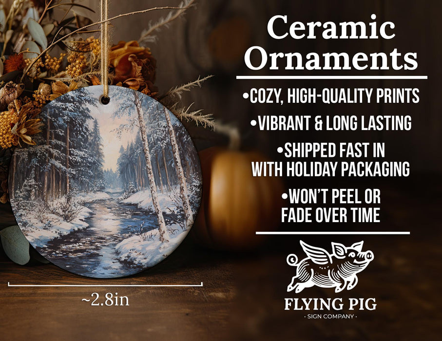a ceramic ornament with a picture of a forest
