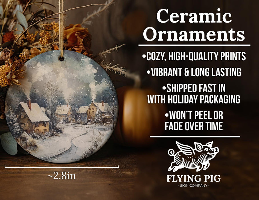 a ceramic ornament with a winter scene on it