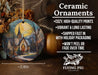 a ceramic ornament with a painting of a church
