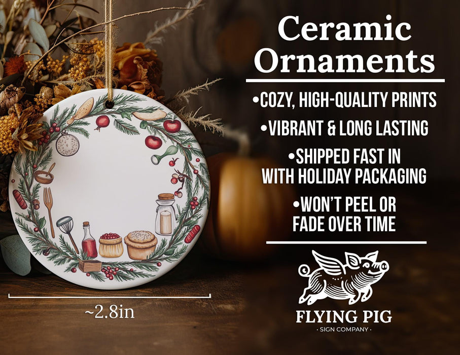 a ceramic ornament on a table next to autumn decorations