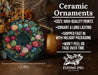 a ceramic ornament with colorful balls of yarn on it