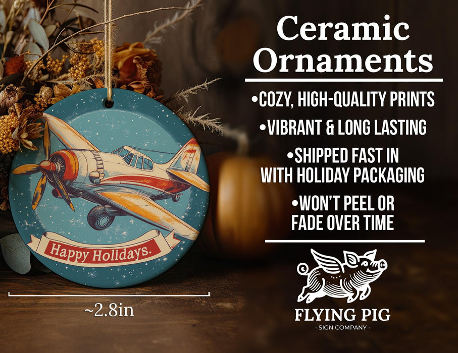 a ceramic ornament with a picture of a plane on it