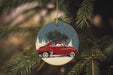 a christmas ornament hanging from a tree