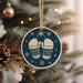 a christmas ornament hanging from a christmas tree