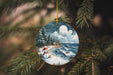 a christmas ornament hanging from a christmas tree