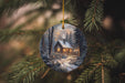 a christmas ornament hanging from a christmas tree