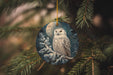 an ornament hanging from a christmas tree