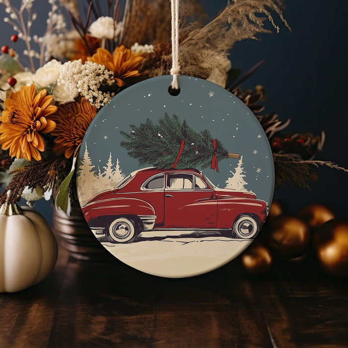 a red car with a christmas tree on top of it