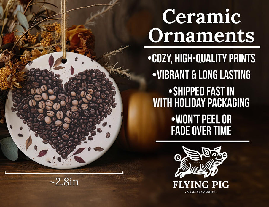 a ceramic ornament with coffee beans in the shape of a heart
