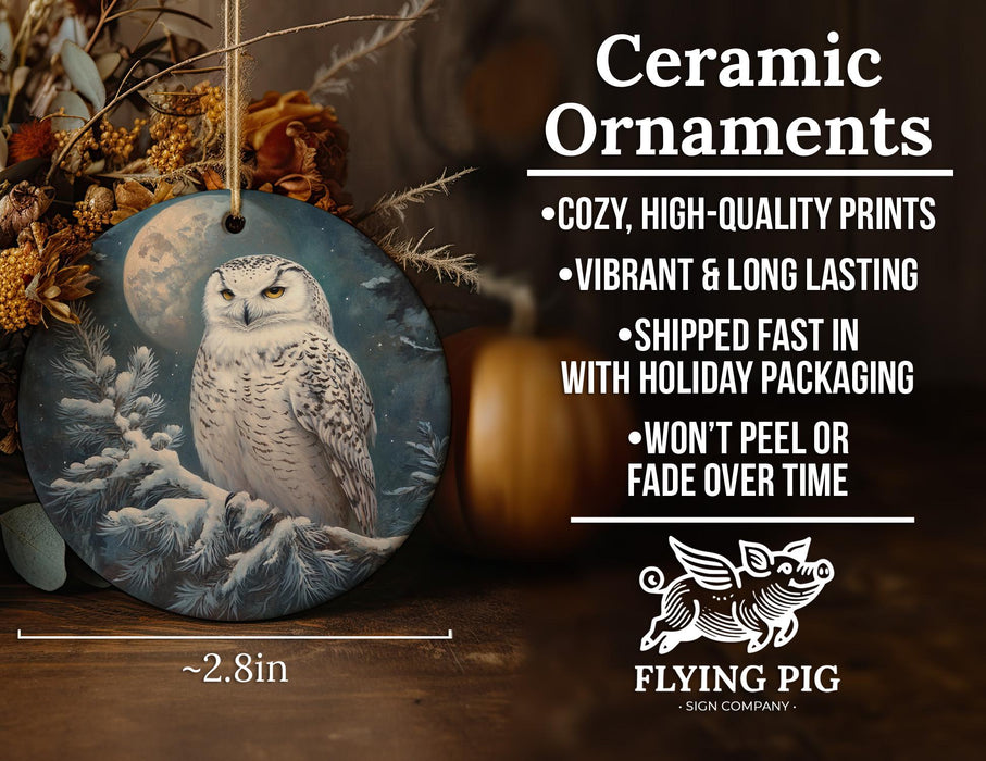 a ceramic ornament with an owl sitting on a branch