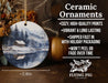 a ceramic ornament with a winter scene on it