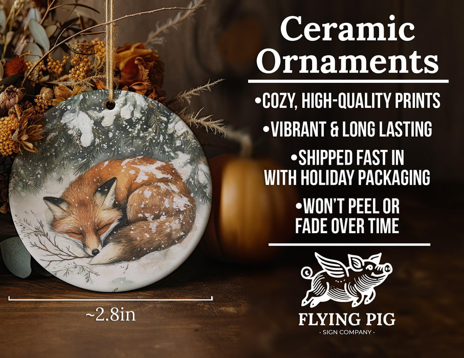 a ceramic ornament with a picture of a fox