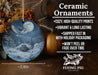 a ceramic ornament with an image of a snowy mountain scene