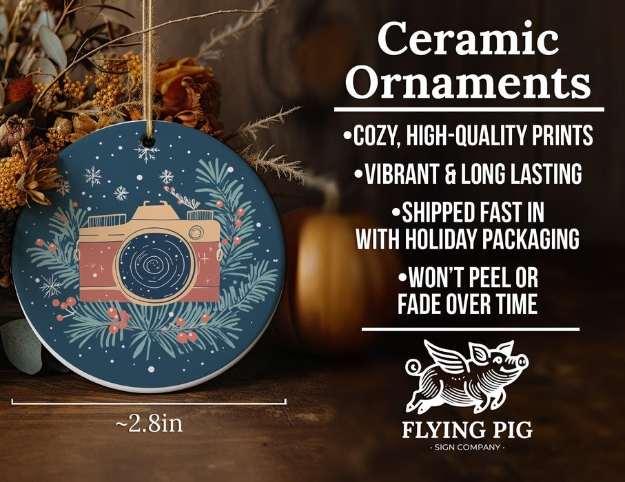 a ceramic ornament with a camera on it