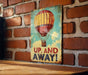 a picture of a hot air balloon on a brick wall