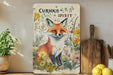 a painting of a fox on a shelf