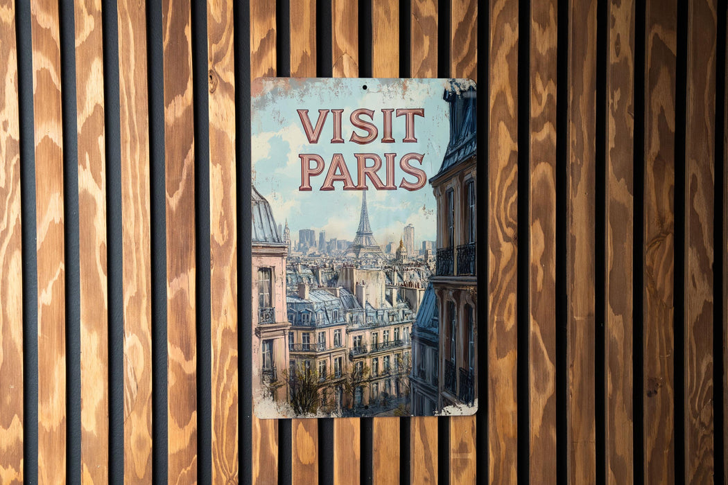 a sign on a wooden wall that says visit paris