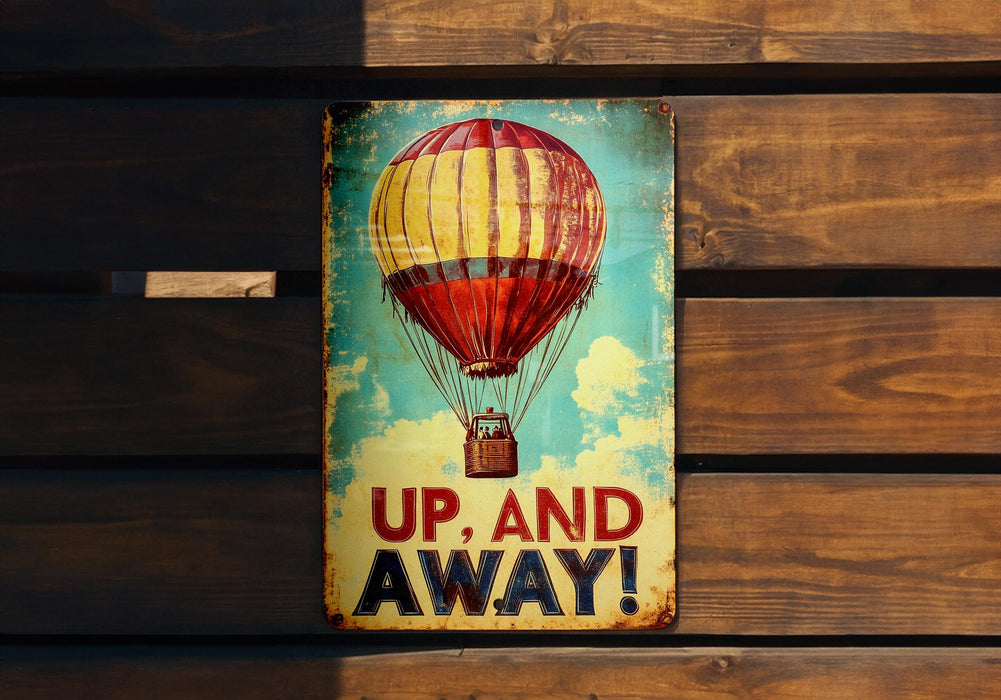 a sign that says up and away with a hot air balloon