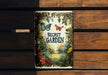 a book sitting on top of a wooden bench