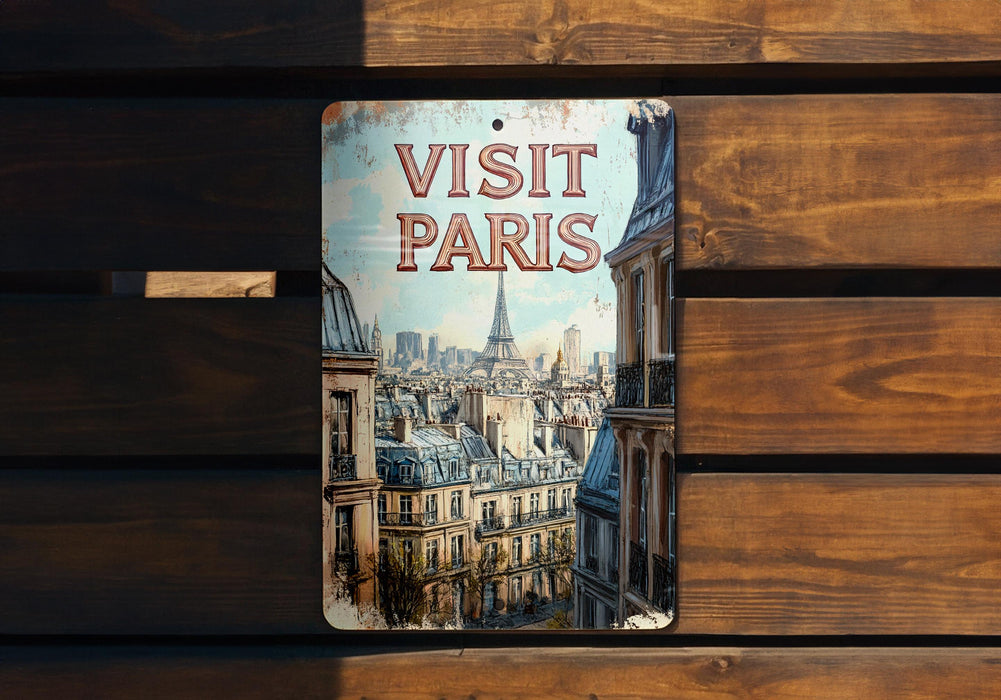 a sign on a wooden bench that says visit paris