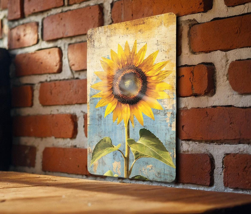 a painting of a sunflower on a brick wall