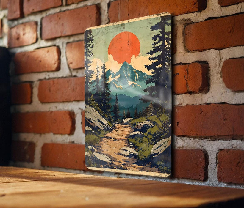 a picture of a mountain scene on a brick wall