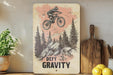a picture of a man on a bike on a shelf
