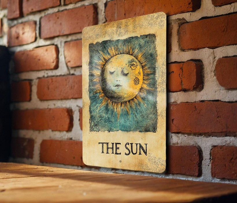 a picture of a sun on a brick wall