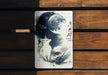 a picture of a wolf on a wooden bench