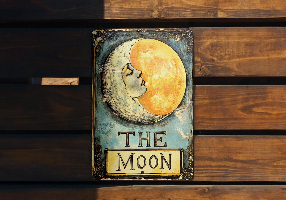 a sign that says the moon with a picture of a woman's face