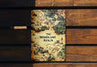 a book sitting on top of a wooden bench