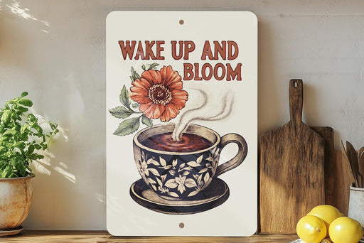 a sign that says wake up and bloom next to a potted plant