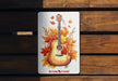 a picture of a guitar with autumn leaves on it