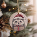 a christmas ornament hanging from a christmas tree