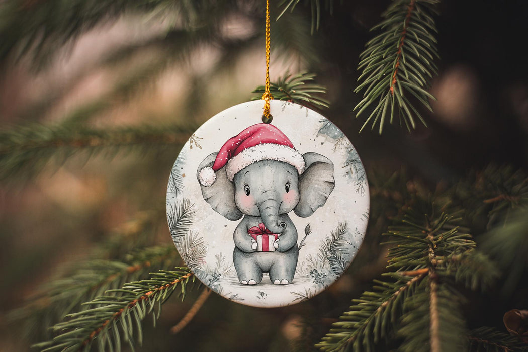 a christmas ornament with an elephant wearing a santa hat