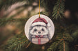 a christmas ornament hanging from a christmas tree