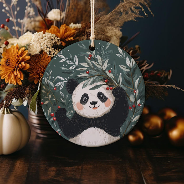 a ceramic ornament with a panda bear on it