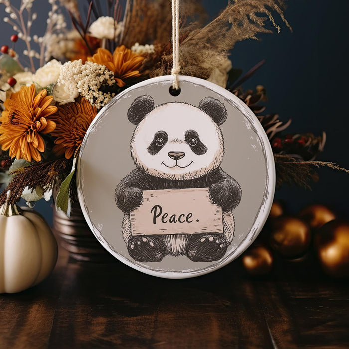 a picture of a panda holding a sign