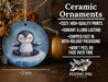 a ceramic ornament with a penguin on it