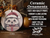 a ceramic ornament with a picture of a hedge holding a present