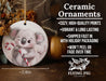 a ceramic ornament with a koala holding a candy cane