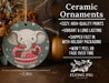 a ceramic ornament with an elephant wearing a sweater