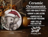 a ceramic ornament with an elephant wearing a santa hat