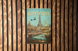 a city of love book hanging on a wooden wall