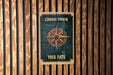 a sign on a wooden wall that says choose your path