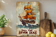 a painting of a sail the seven seas on a shelf