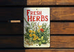 a sign on a wooden bench that says fresh herbs